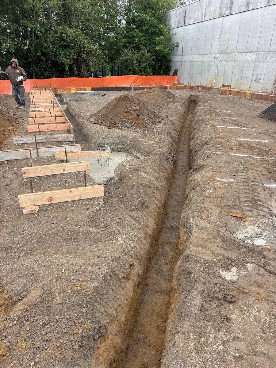 Foundation excavation and perimeter formwork in progress at the Somerset Gardens project.