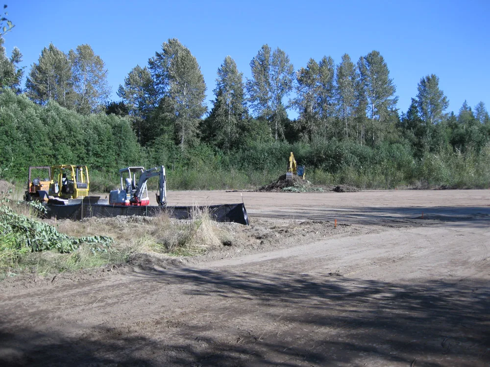 Site grading with heavy equipment